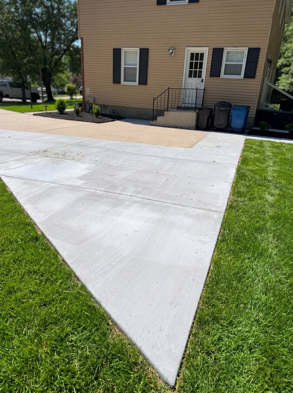 Concrete walkway extension by Green Life Landscaping